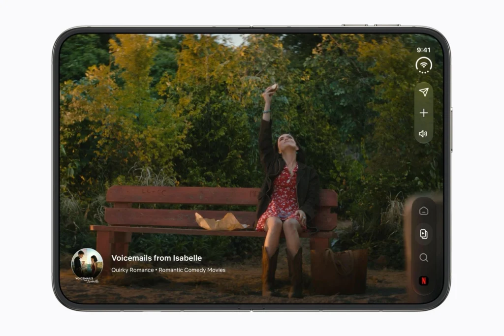 Opened iPhone Duo in landscape showing a video app on the 7.6-inch inner display